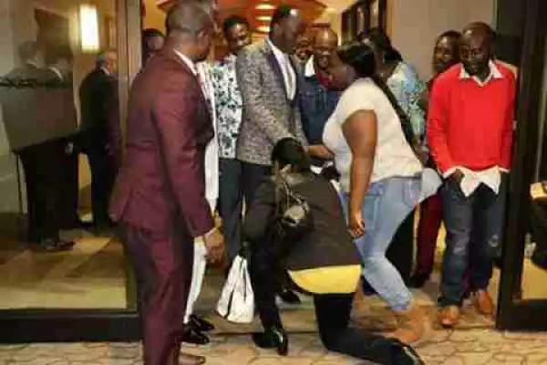 Lady Kneels Down To Greet Apostle Suleman As He Steps Out In Style In USA